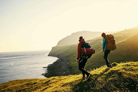 Travel-makes-you-richer-couple-hiking-